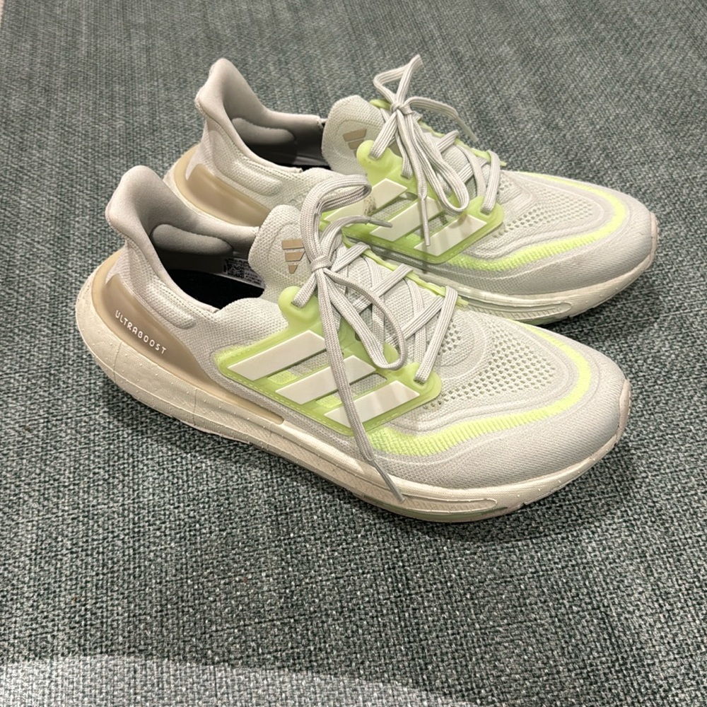 Adidas Ultraboost Size 9, worn less than 20 times. Light wear. White/neon